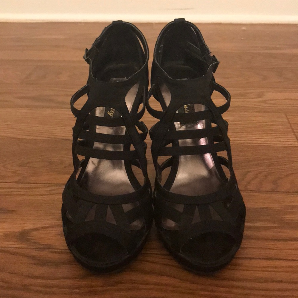 Strappy black heels.